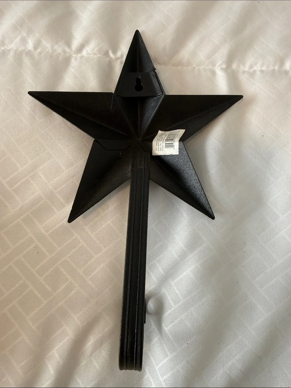 antique bronze barn star with hook.  5.5 x 8